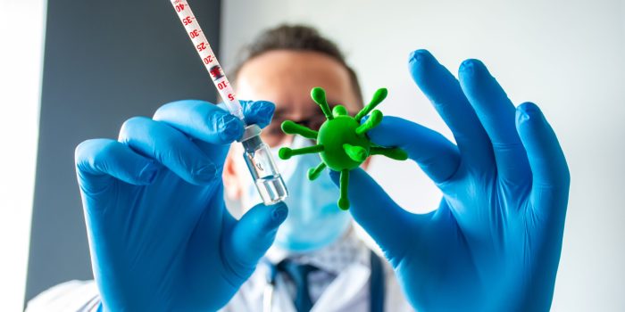 Scientist holding bacteria image