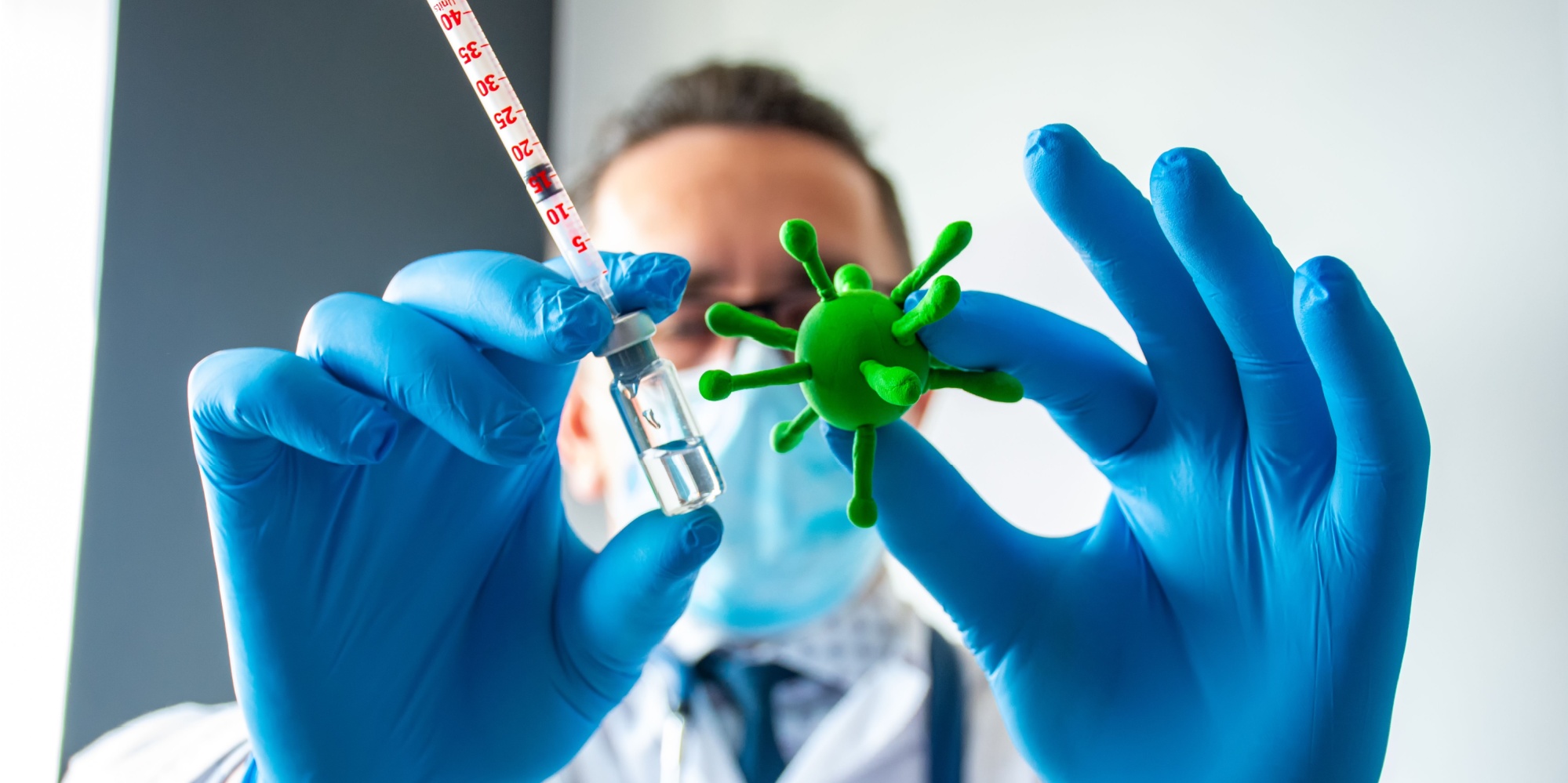 Scientist holding bacteria image